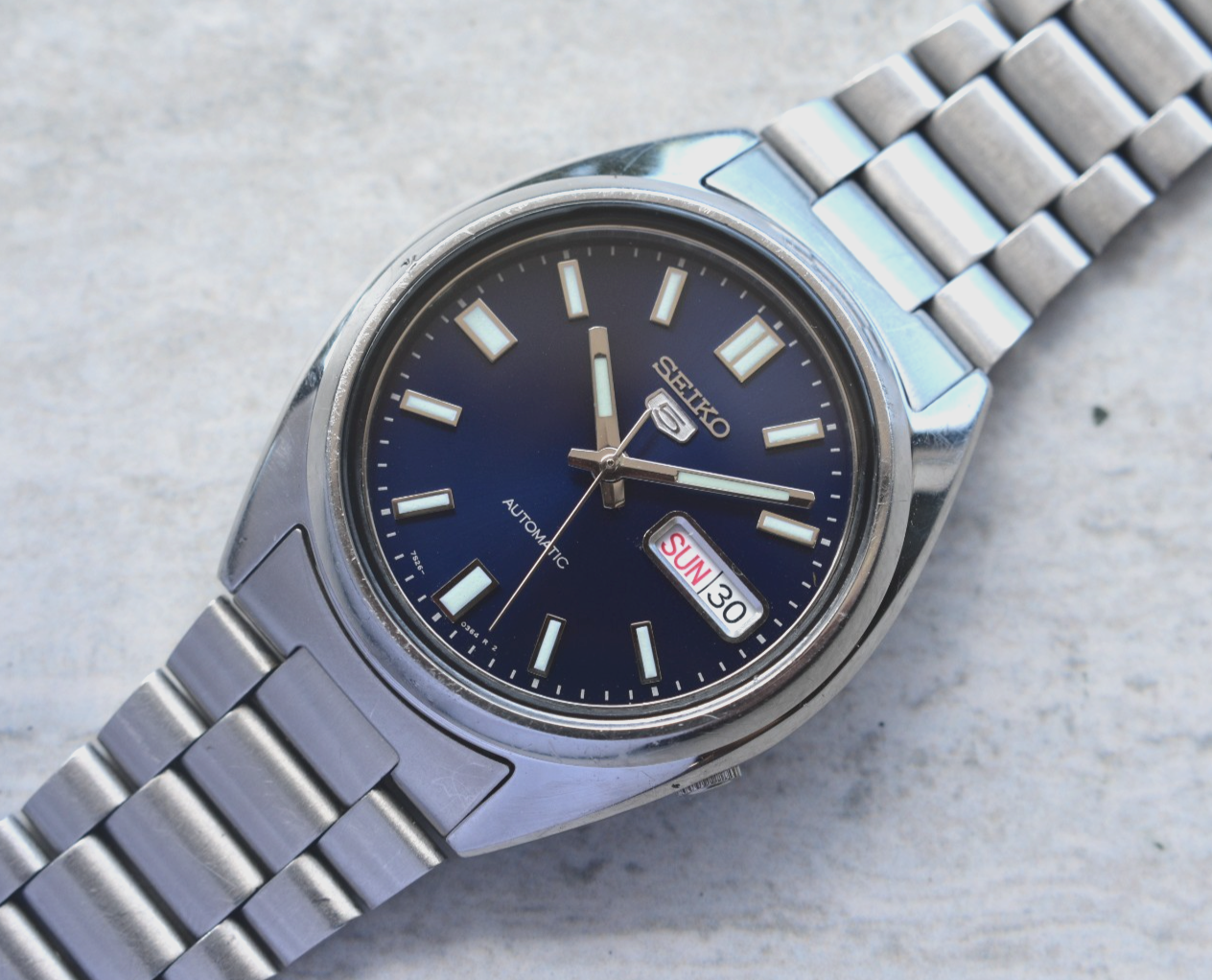 Seiko SNXS77 Automatic Steel Bracelet Day Date Watch Blue Dial 7S26